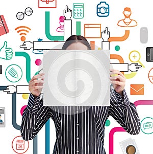 Composite image of smiling woman showing a big business card in front of her face