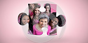 Composite image of smiling women in pink outfits posing for breast cancer awareness