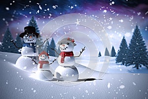 Composite image of snowman family