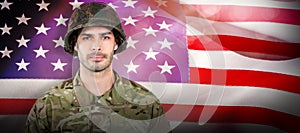 Composite image of soldier standing against white background