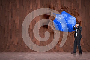 Composite image of stressed businessman with hands on head