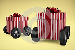 Composite image of striped white and red gift box with wheels