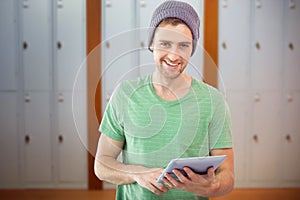 Composite image of student using tablet