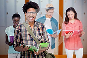 Composite image of stylish students smiling at camera together