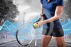 Composite image of tennis player holding a racquet ready to serve