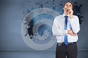 Composite image of thinking businessman biting glasses photo