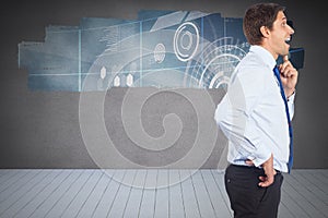 Composite image of thinking businessman touching his chin