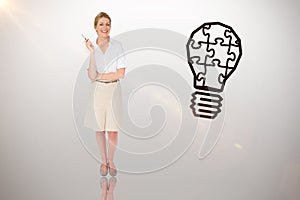 Composite image of thinking businesswoman