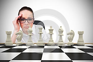 Composite image of thinking businesswoman