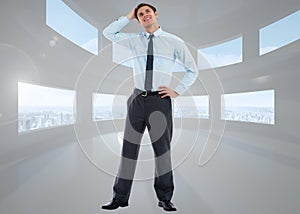 Composite image of thoughtful businessman with hand on head