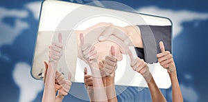 Composite image of thumbs raised and hands up