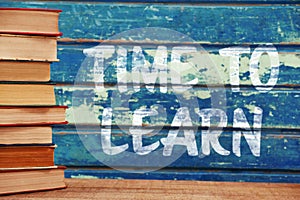 Composite image of time to learn text against white background