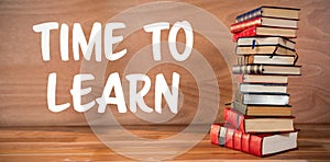 Composite image of time to learn text against white background