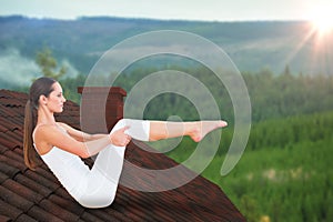 Composite image of toned woman doing the boat pose in fitness studio