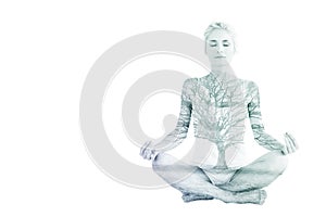 Composite image of toned young woman sitting in lotus pose with eyes closed