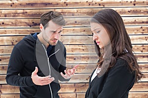 Composite image of unhappy brunette listening to boyfriend