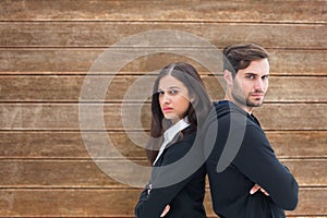 Composite image of unhappy couple not speaking to each other