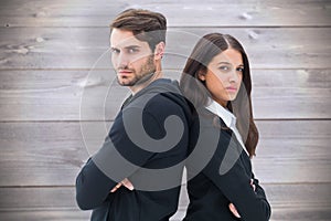 Composite image of unhappy couple not speaking to each other