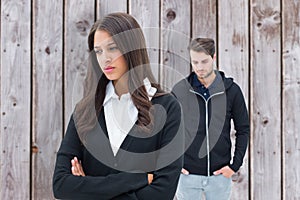 Composite image of unhappy couple not speaking to each other