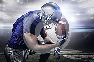 Composite image of upset american football player with ball