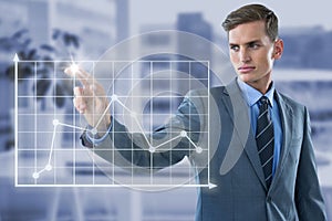 Composite image of well dressed young businessman touching virtual graph