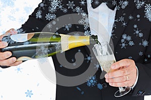 Composite image of welldressed man pouring champagne