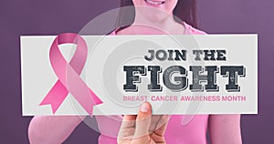 Composite image of woman with pink ribbon and breast cancer awareness slogan