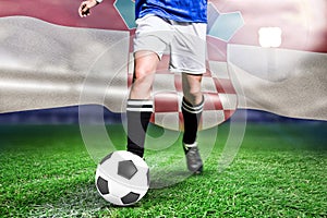 Composite image of woman soccer player progressing with a ball