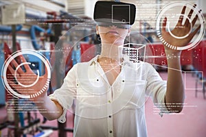 Composite image of woman using a virtual reality device