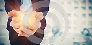 Composite image of womans hands cupped