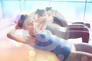 Composite image of women doing situps