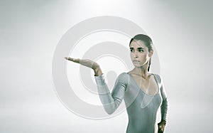 Composite image of young woman gesturing against white background