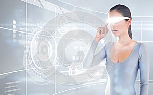 Composite image of young woman using virtual video glasses