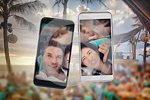 Composite of young beautiful and happy mixed ethnicity Asian and Caucasian couple and mobile phones in love and posting selfie pic