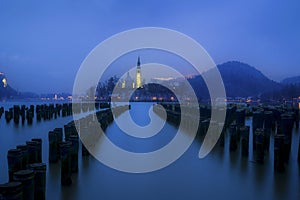 Compositing Shot of New York City Pier Poles and Bled Lake in Slovenia photo