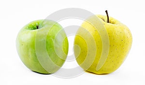 Composition of apples on a white background - green and yellow - still life