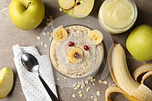 Composition with baby food on background, top view