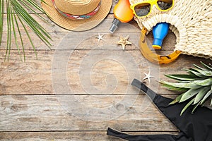 Composition with beach  and space for text on wooden background, flat lay