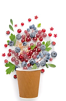 Composition - a berry fountain from a brown cup