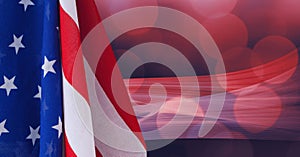 Composition of billowing american flag over defocussed red bokeh lights on dark background