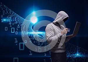 Composition of binary coding over hacker in hood using credit card and laptop