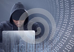 Composition of binary coding over hacker in hood using laptop