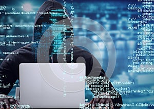 Composition of binary coding over hacker in hood using laptop