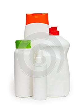 Composition of bottles of cleaners household chemicals isolated on a white background