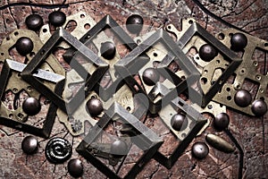 Composition of brass parts, rivets and gears of different sizes. Steampunk background