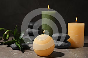 Composition with candles and spa stones