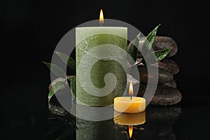 Composition with candles and spa stones