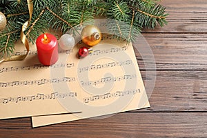 Composition with Christmas decorations and music sheets