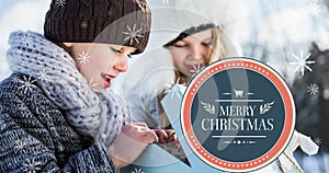 Composition of christmas greeting with surprised caucasian children opening gift box