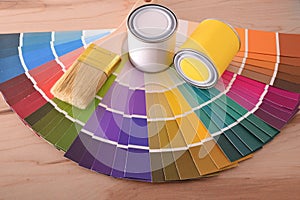 Composition with color chart in fan pots and brush top